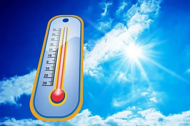 A thermometer showing high temperatures