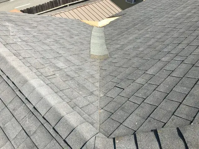 An incorrectly repaired valley for How Long Will Your Asphalt Shingle Roof Last?