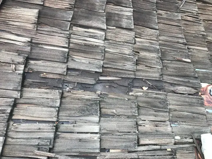 Damaged and missing wood shakes