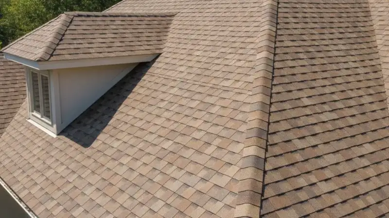 Architectural asphalt shingle roof on a home showing dimensional shingle courses