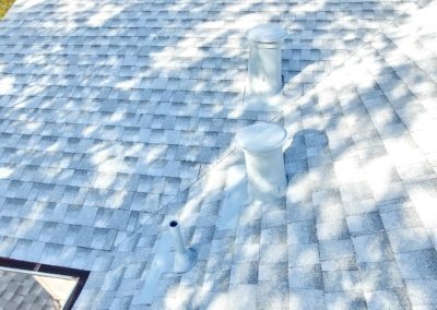 close-up of newly repaired asphalt shingle roof by Roof Doctors