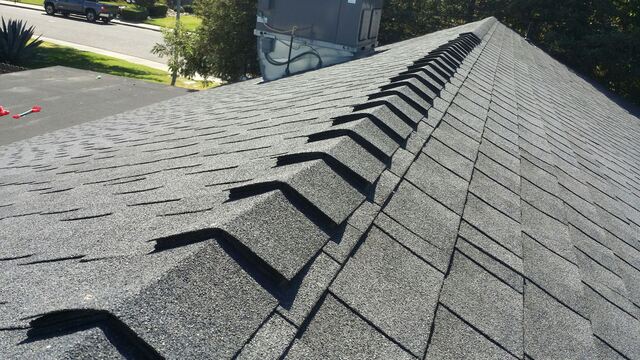 ridge cap on an asphalt shingle roof