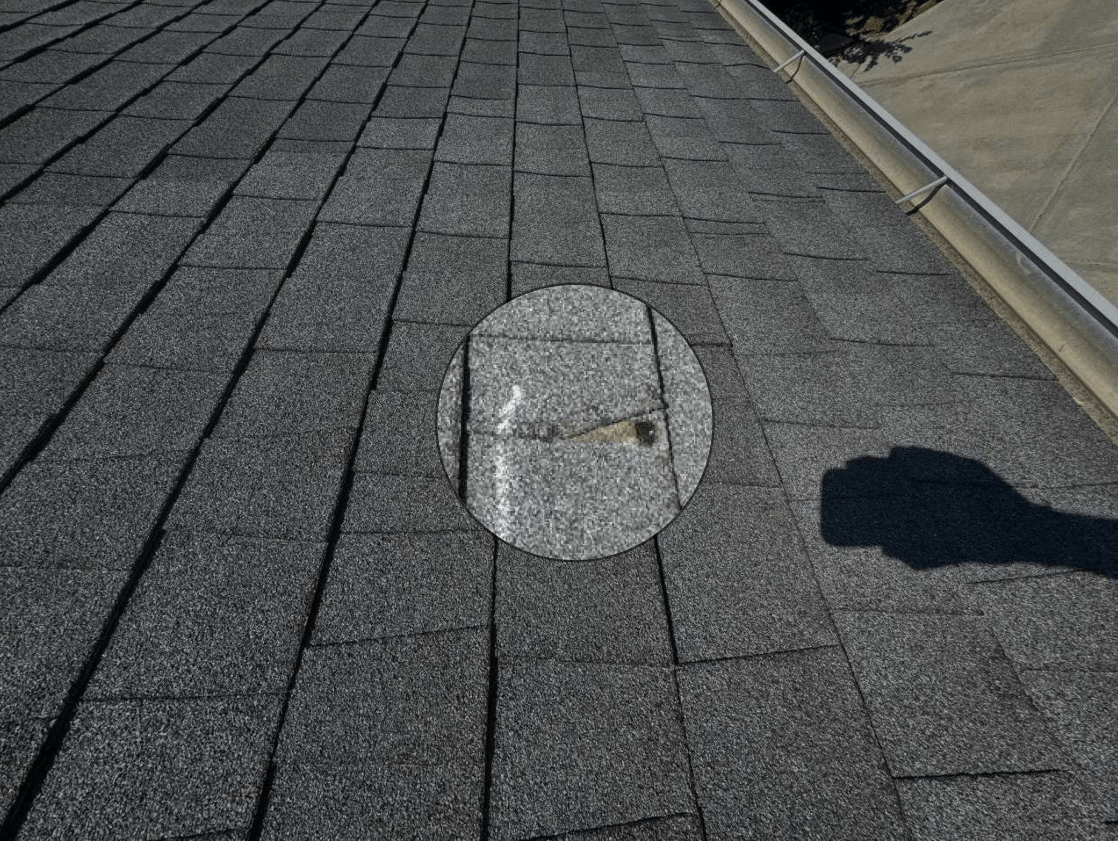 Roof shingle tab missing from Wind Damage